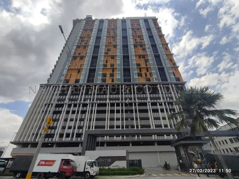 Exterior type: high-rise condominium; features: glass curtain wall, wooden cladding, recessed balconies, vertical fins, approximately 20-storey high-rise, manicured landscaping, palm trees, driveway with interlocking pavers; style: modern.