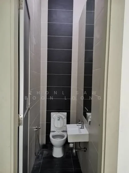 Bathroom features: white toilet, wall-mounted sink, chrome faucet, black tile flooring, white tiled walls, dark accent wall, bidet spray, mirror above sink; style: modern.