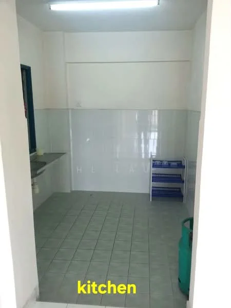 Kitchen features: white tiled walls, grey tiled flooring, single-bowl stainless-steel sink, wall-mounted cabinet, open shelving unit, fluorescent ceiling light, window with blue frame, empty countertop space.