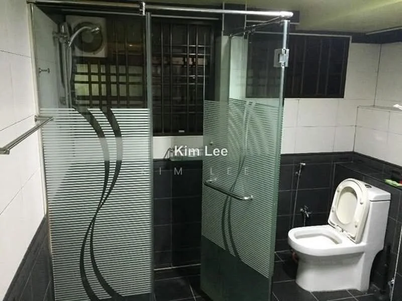 Bathroom features: glass shower enclosure with decorative pattern, rain shower head, toilet, black tiled flooring, white tiled walls, chrome towel rail, wall-mounted shower controls, framed mirror; style: modern.
