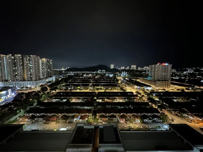 Exterior type: high-rise condominium; features: night view of city skyline, multiple high-rise buildings, street lights visible, low-rise residential buildings, parking spaces visible, mountain silhouette in background, urban landscape, well-lit streets; style: modern.