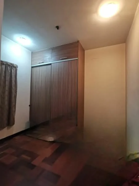 Bedroom features: wooden flooring, built-in wardrobe with sliding doors, two ceiling lights, curtains on window, neutral wall color, corner of the room with no visible furniture.