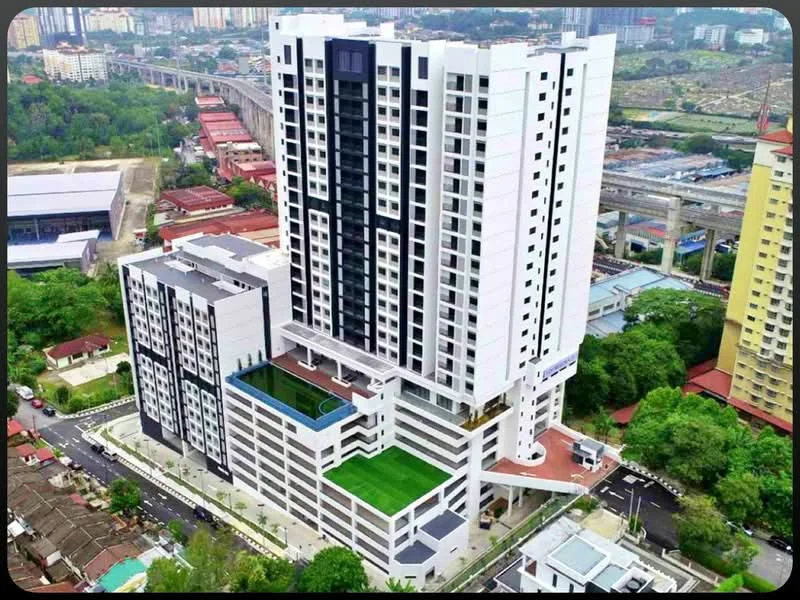 Exterior type: high-rise condominium; features: white painted facade, glass curtain wall, recessed balconies, flat roof, approximately 15-storey high-rise, manicured lawn, surrounded by mature greenery, swimming pool deck, outdoor amenities area, parking deck, urban context with nearby buildings; style: modern.