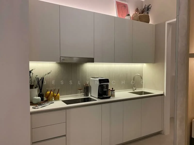Kitchen features: white cabinetry, stainless-steel sink, chrome pull-down faucet, built-in oven, freestanding coffee machine, countertop with light grey surface, under-cabinet lighting, decorative plants, fruit bowl, kitchen utensils, minimalist design; style: modern.