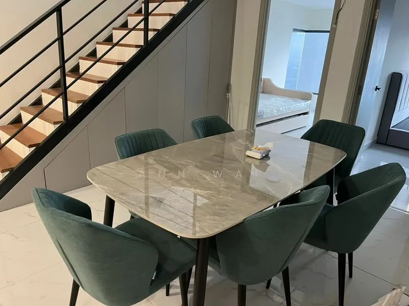 Dining features: marble dining table, 6 upholstered dining chairs in teal, white tiled flooring, staircase with black railing in background, large window with natural light, decorative item on table; style: modern. Room features: light-colored walls, visible bed in background, minimalist decor.