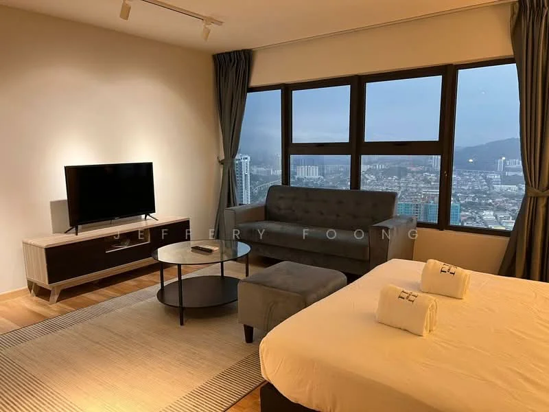 Living features: floor-to-ceiling windows, grey fabric sofa, coffee table, TV console, wall-mounted TV, area rug, wooden flooring, curtains, city view; style: modern; view: city. Room features: queen-size bed, white bedding, towels.