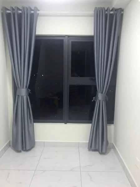 Room features: grey curtains, floor-to-ceiling window, white walls, marble tile flooring, window frame in black, city view visible through window; view: city.