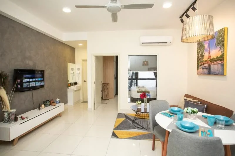 Living features: grey accent wall, white painted walls, polished tile flooring, 5-blade ceiling fan with light, wall-mounted TV, white TV console, decorative wall art, dining table with 4 grey chairs, blue dinnerware on table, area rug with geometric pattern, sliding glass door, window with sheer curtains; style: modern.