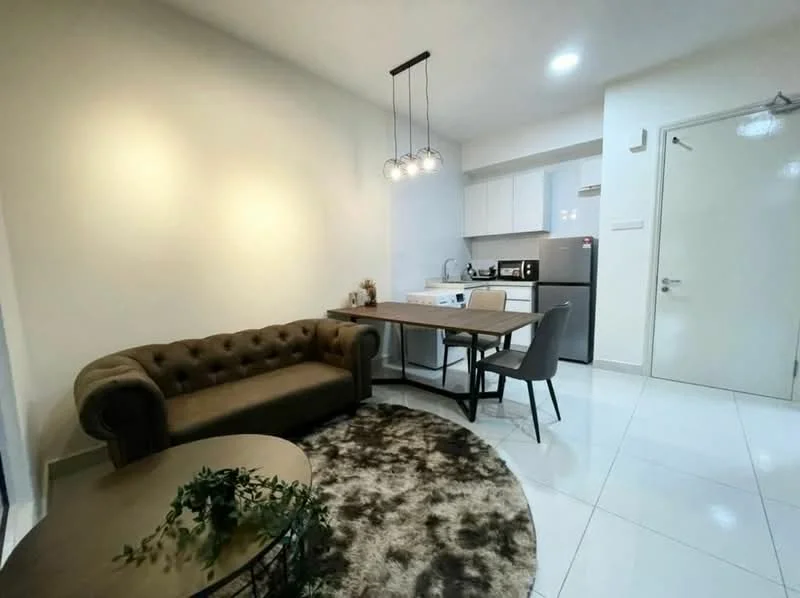 Living features: beige tufted fabric sofa, round coffee table with black metal base, area rug with geometric pattern, dining table with four grey chairs, white kitchen cabinetry, stainless-steel fridge, built-in oven, ceramic tile flooring, recessed LED downlights, white painted walls, window with sheer curtains; style: modern.