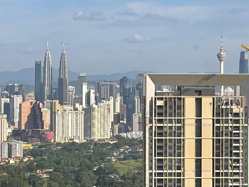 Exterior type: high-rise condominium; features: city skyline view, glass curtain wall, recessed balconies, feature lighting at night; style: modern.