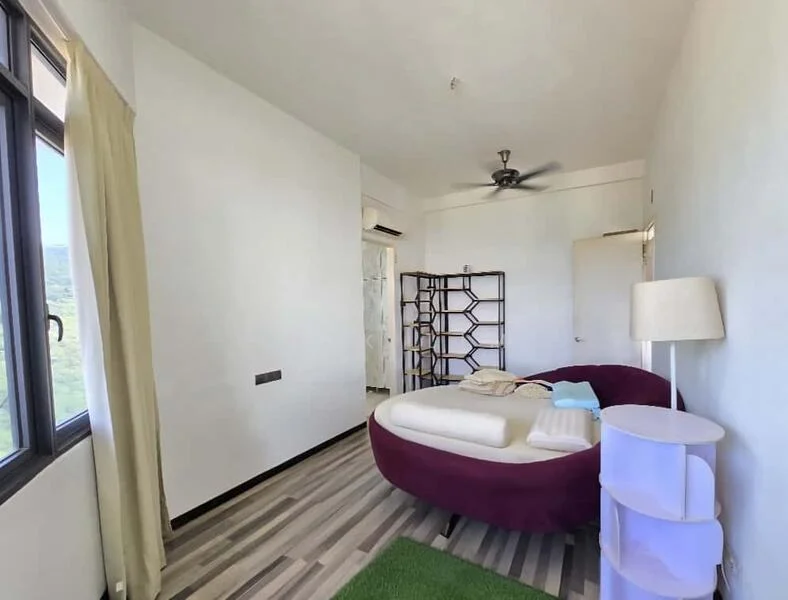 Bedroom features: round bed with purple upholstery, white bedding, ceiling fan, large window with mountain view, light-colored walls, laminate flooring, green area rug, decorative room divider, lamp, built-in wardrobe; style: modern; view: mountain.