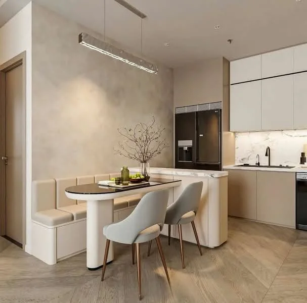Kitchen features: white cabinetry with flat-panel design, black countertop, marble backsplash, stainless-steel fridge, built-in oven, black sink, chrome faucet, pendant lighting, dining nook with upholstered seating, two dining chairs, wooden flooring, recessed ceiling lights; style: modern.