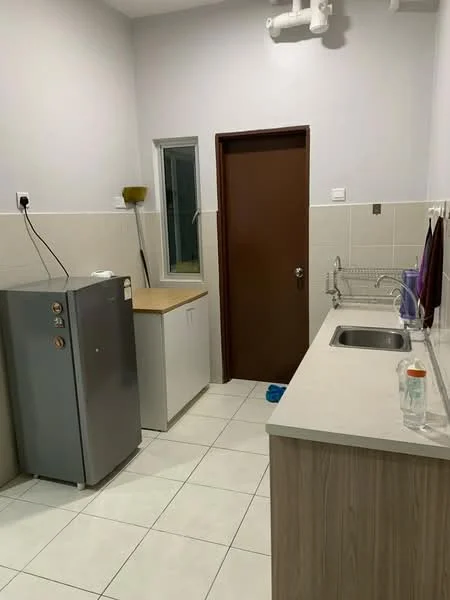 Kitchen features: grey fridge, white cabinetry, light wood countertop, stainless-steel sink, single-bowl sink, chrome faucet, white tiled walls, white tiled flooring, window, brown door, kitchen utensils on countertop; style: modern.