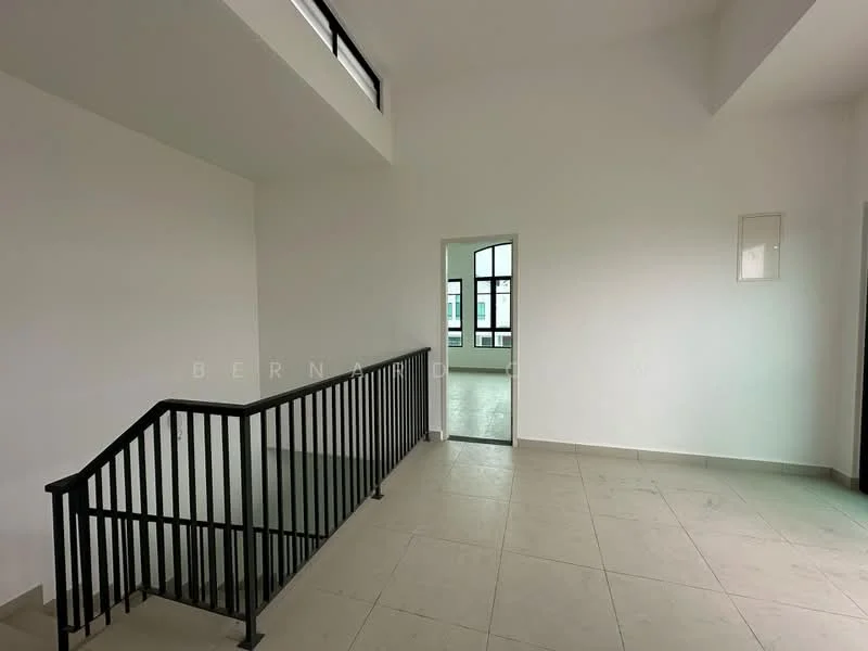 Room features: white painted walls, tile flooring, black metal railing, large windows, open space, high ceiling, doorway leading to another room, natural light; style: modern.