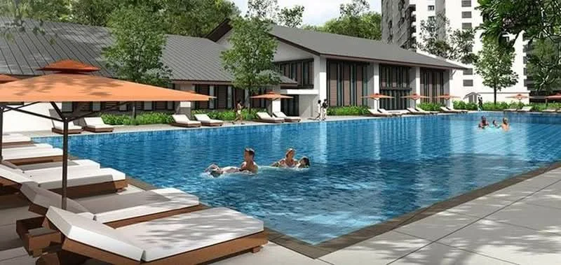 Exterior type: swimming pool deck; features: infinity pool, pool deck with loungers, outdoor umbrellas, surrounded by landscaped greenery, modern clubhouse, tiled flooring around pool, lounge chairs, trees in background; style: modern.