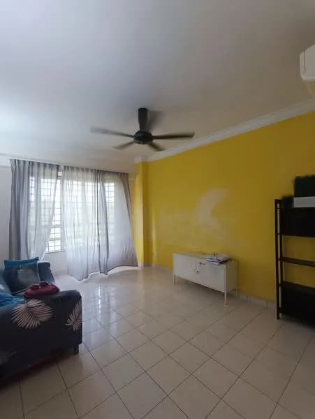Living features: yellow painted walls, white ceiling, tiled flooring, 5-blade ceiling fan, floor-to-ceiling windows, sheer curtains, white sideboard, black shelving unit, sofa with floral pattern, decorative cushions; style: modern.