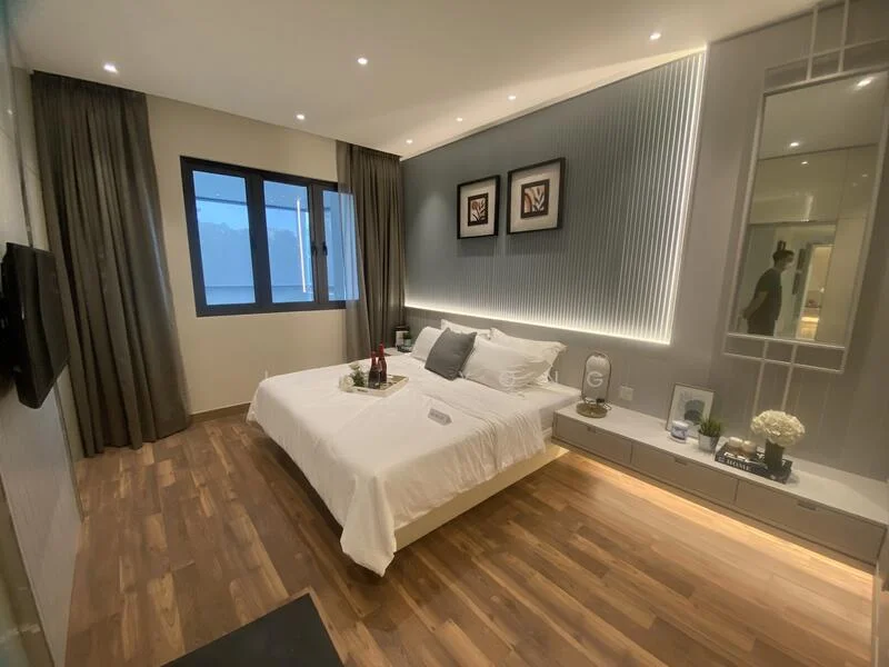 Bedroom features: king-size bed with white bedding, upholstered headboard, two bedside tables, wall-mounted TV, wooden flooring, grey accent wall, recessed LED downlights, floor-to-ceiling windows with sheer curtains, decorative artwork on walls, built-in wardrobe with mirror, decorative vase on bedside table, area rug with geometric pattern; style: modern.