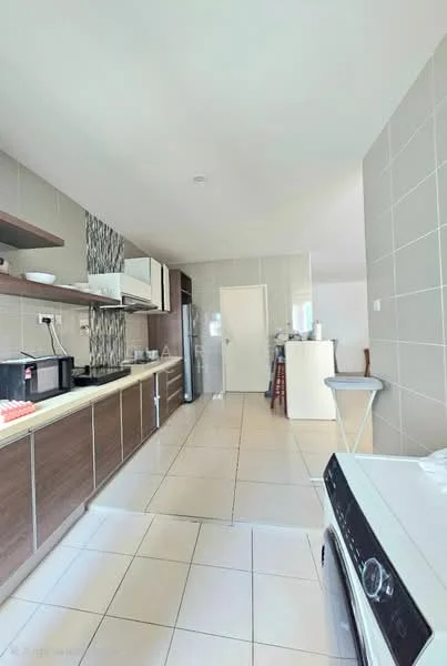 Kitchen features: white cabinets, brown wooden cabinetry, stainless-steel refrigerator, built-in oven, 4-burner gas hob, stainless-steel range hood, double-bowl stainless-steel sink, white tiled backsplash, white tiled flooring, wall-mounted microwave, washing machine, countertop with space for appliances, open layout, recessed lighting; style: modern.