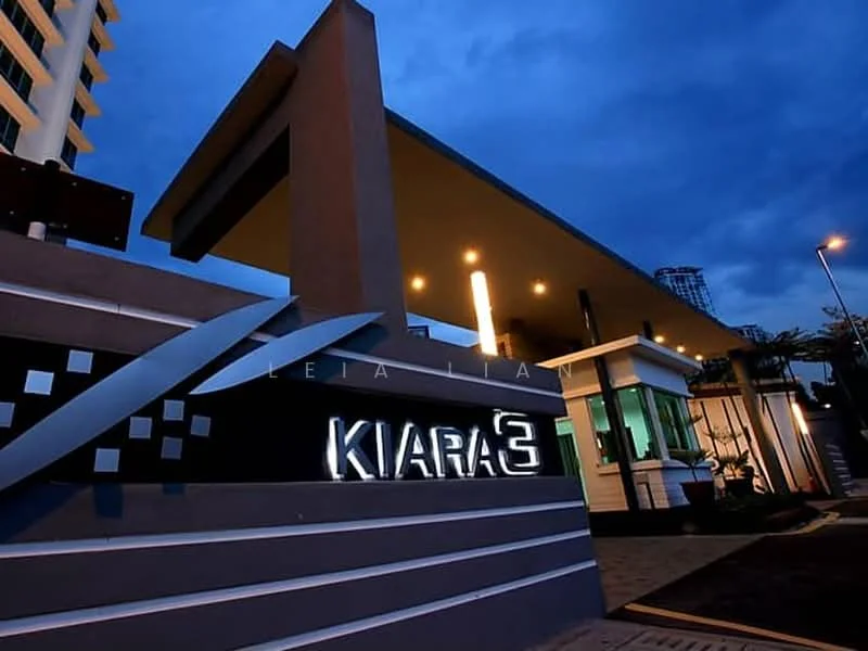 Exterior type: high-rise condominium; features: modern facade with illuminated signage, glass entrance, overhang roof, decorative wall elements, landscaped entrance area, paved walkway, night lighting, surrounding greenery; style: modern.