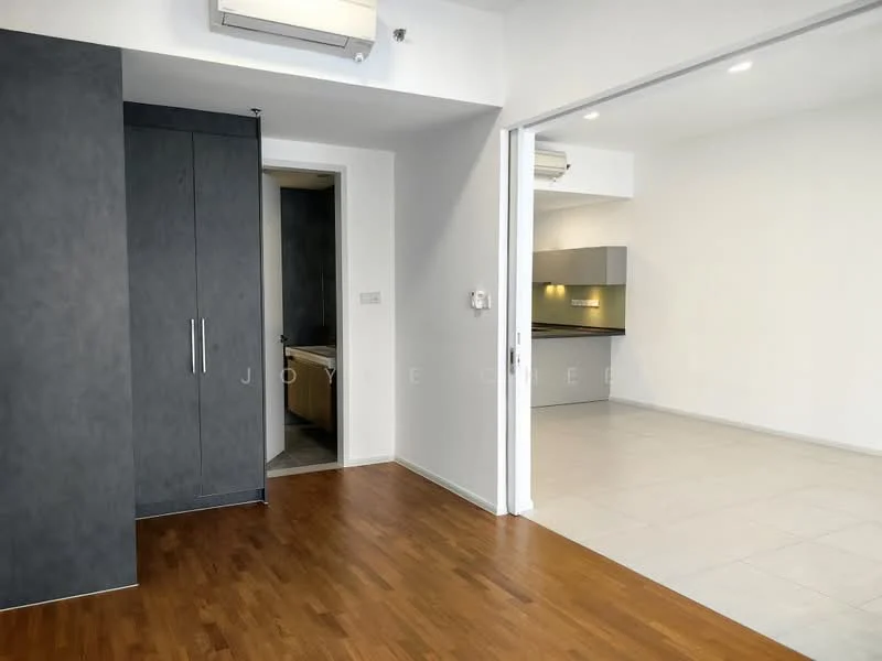 Room features: wooden flooring, white painted walls, built-in wardrobe with grey finish, air conditioning unit, doorway leading to bathroom, open layout to adjacent room, tile flooring in adjacent area, recessed lighting; style: modern.