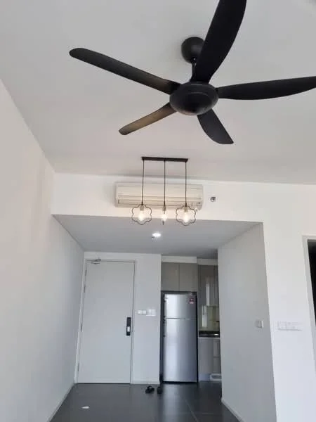 Living features: 5-blade ceiling fan in black, recessed LED downlights, wall-mounted split AC, grey tiled flooring, white painted walls, door leading to hallway, fridge, open layout to kitchen; style: modern.
