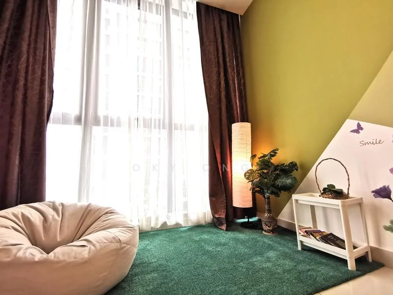 Room features: green accent wall, floor-to-ceiling windows, sheer curtains, dark brown curtains, bean bag chair, green carpet flooring, decorative floor lamp, potted plant, white side table, books on side table, decorative wall with butterflies; style: modern.