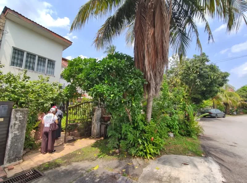 Exterior type: detached bungalow; features: lush tropical landscaping, mature palm trees, manicured garden, brick pathway, gate entrance, surrounded by greenery, single-storey, residential street view; style: tropical-modern.