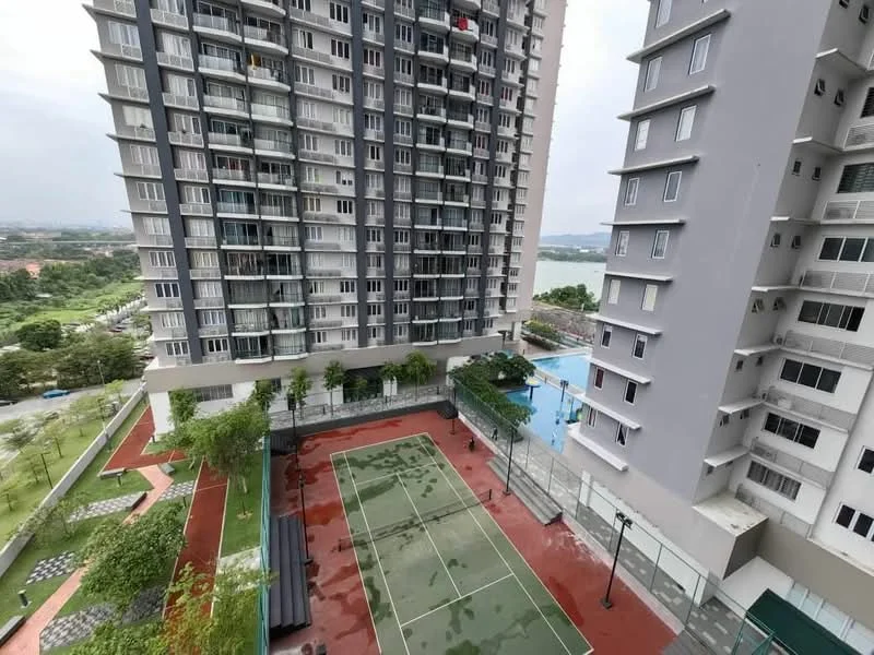 Exterior type: high-rise condominium; features: tennis court, swimming pool, landscaped garden, manicured lawn, balconies on residential units, surrounding greenery, paved walkways, outdoor lighting, view of water body, multiple storeys, modern architectural design; style: modern.