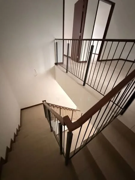 Room features: staircase with wooden handrail, metal balustrade, cream painted walls, light-colored flooring, natural light from upper levels, open space design, multiple landings, neutral color palette; style: modern.