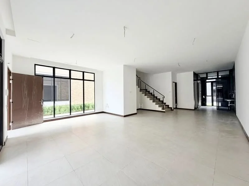 Room features: large floor-to-ceiling windows, white painted walls, light-colored tile flooring, open layout, staircase with metal railing, double-door main entrance, natural light from windows, neutral color scheme; style: modern; view: garden.
