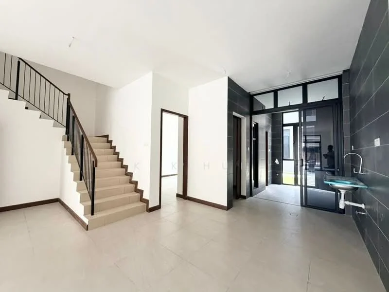 Room features: staircase with black metal railing, light-colored tiled flooring, white painted walls, large glass door, window with black frame, sink with faucet, open layout, natural light from windows; style: modern.