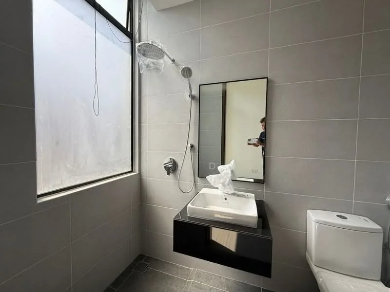 Bathroom features: grey tiled walls, black floating vanity, white rectangular sink, chrome basin mixer faucet, large framed mirror, walk-in shower with glass enclosure, rain shower head, handheld shower, one-piece toilet, black floor tiles, floor-to-ceiling window; style: modern.