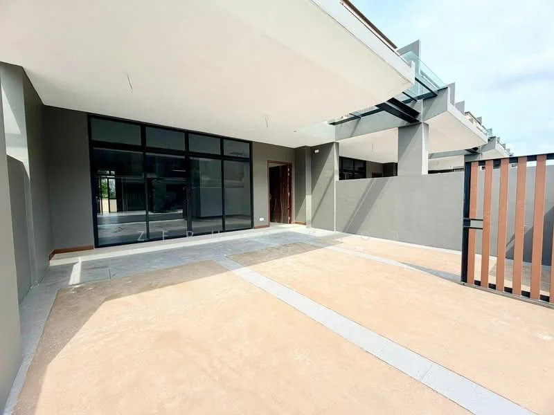 Exterior type: detached bungalow; features: concrete flooring, glass sliding doors, large windows, grey painted walls, overhang roof, fenced perimeter, patio area, minimalist design, open space layout; style: modern.