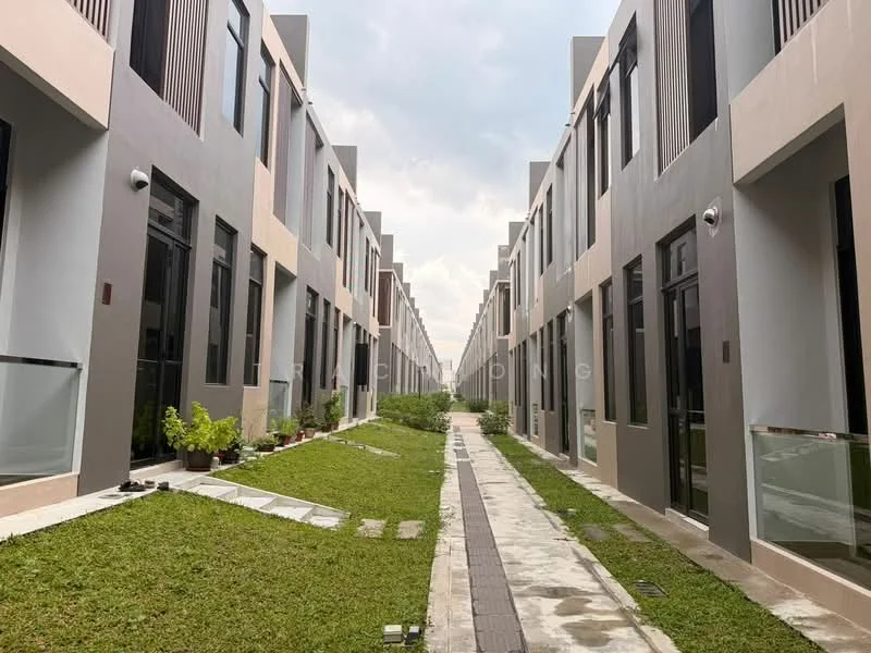 Exterior type: linked terrace house; features: two-storey linked terrace houses, concrete facade with pastel colors, glass paneling on ground floor, manicured lawn, paved walkway, landscaped garden area, outdoor lighting fixtures, surrounding greenery; style: modern.