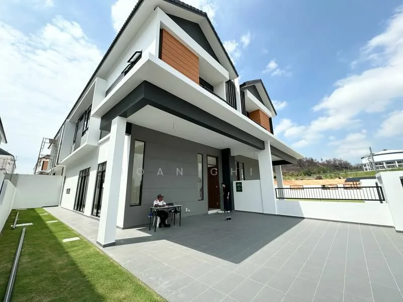 Exterior type: detached bungalow; features: grey tiled flooring, white painted facade, wooden accent panels, large glass windows, double-volume entrance, manicured lawn, fenced perimeter, modern architectural design, gabled roof, outdoor seating area; style: modern.