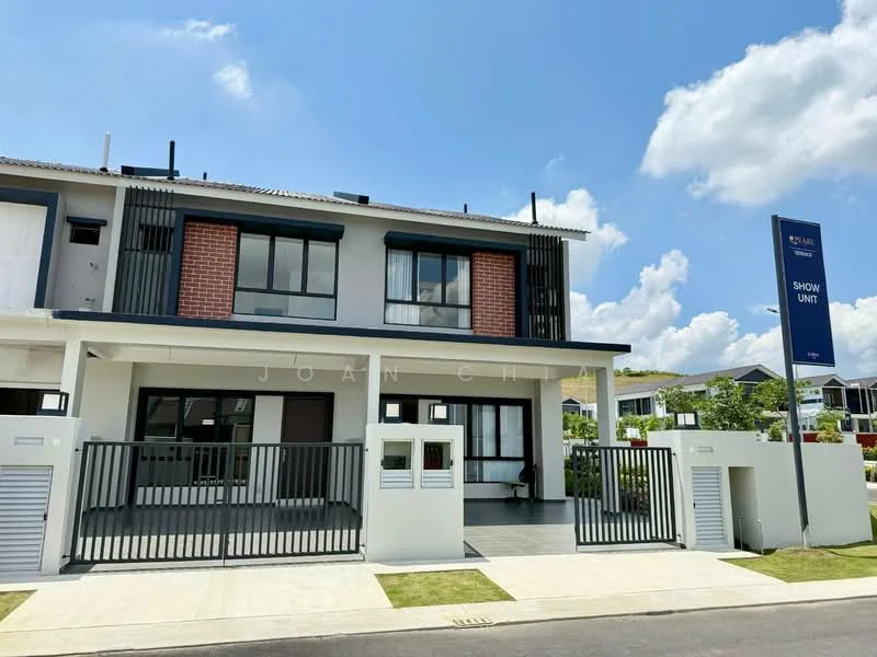 Exterior type: linked terrace house; features: white painted facade, red brick accents, flat roof, two-storey building, manicured landscaping, paved walkway, front porch area with railing, large windows, main entrance gate, show unit signage, surrounded by greenery; style: modern.