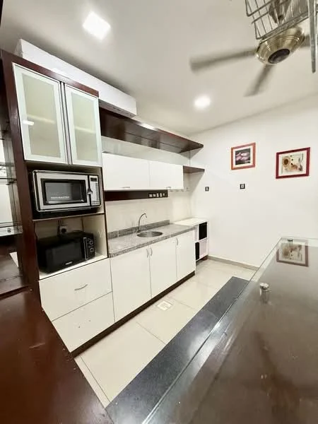 Kitchen features: white cabinetry with glass-front upper cabinets, grey granite countertop, stainless-steel sink, chrome pull-down faucet, built-in microwave, freestanding microwave, ceramic tile flooring, recessed downlights, ceiling fan, wall-mounted shelves, decorative wall art; style: modern.