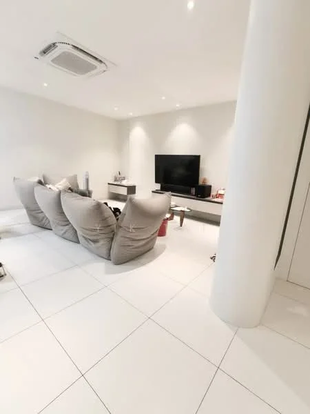 Living features: white painted walls, white tiled flooring, recessed downlights, 5-blade ceiling fan, wall-mounted TV, TV console, 3 oversized bean bag chairs, decorative shelving unit, air conditioning unit; style: modern.