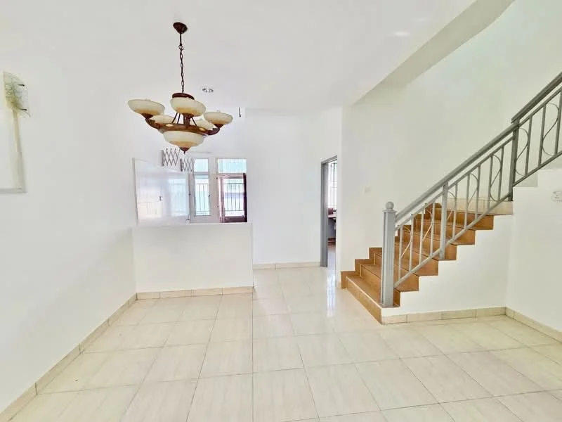 Living features: white painted walls, glossy ceramic tile flooring, chandelier light fixture, staircase with metal railing, large window for natural light, open layout, neutral color scheme, no visible furniture; style: modern.