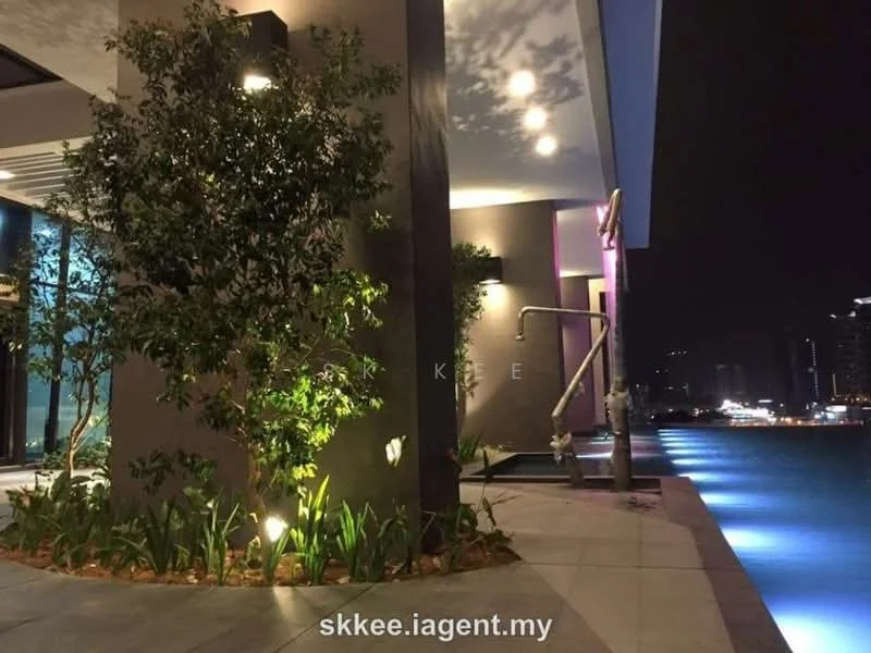 Exterior features: landscaped garden with plants, pathway with stone paving, outdoor lighting fixtures, water feature or pool edge, modern architectural design, glass facade, nighttime illumination, surrounding city skyline; style: modern.
