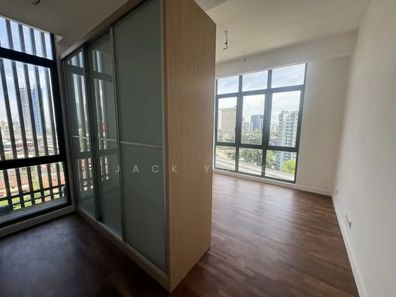 Room features: large floor-to-ceiling windows, wood laminate flooring, glass partition wall, city skyline view, neutral wall colour, high ceiling, natural light, open layout; style: modern; view: city.