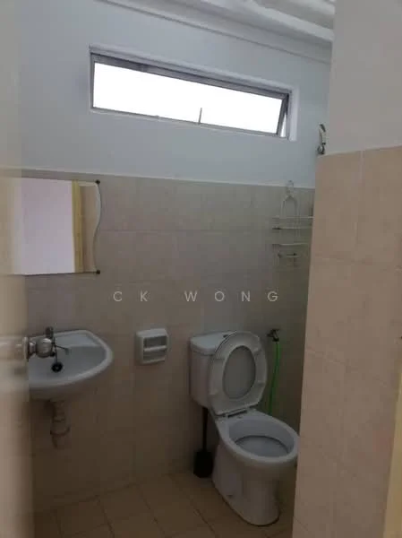 Bathroom features: white tiled walls, cream tiled flooring, single-sink vanity with mirror, toilet, handheld shower, wall-mounted towel rack, window for natural light, soap dish.