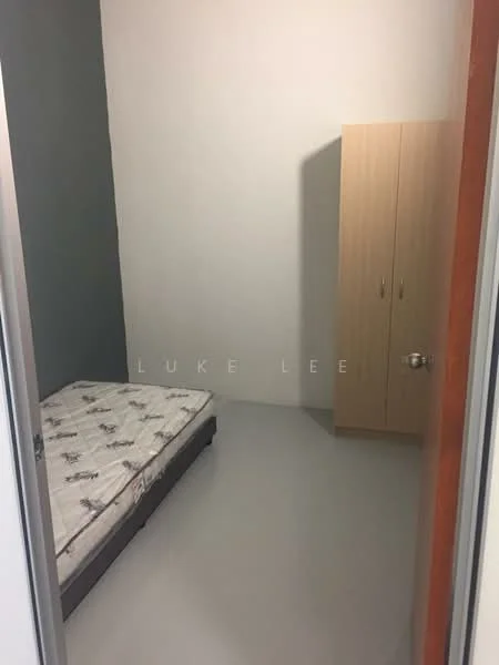 Bedroom features: single bed mattress on bed frame, light grey painted walls, dark grey accent wall, laminate flooring, built-in wardrobe with wooden finish, no visible lighting fixtures, no visible decor.