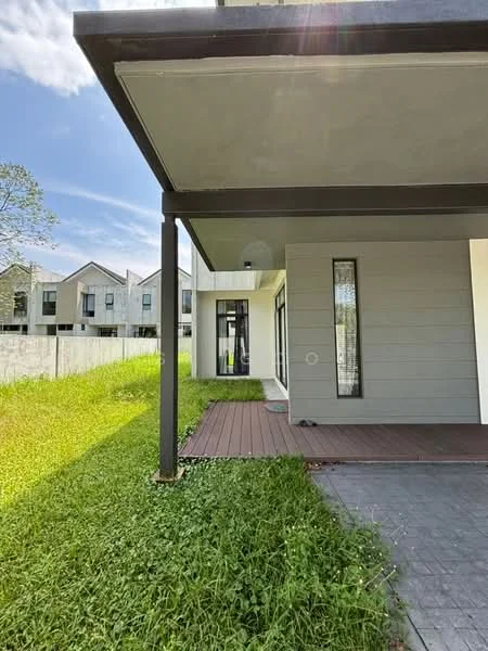 Exterior type: detached bungalow; features: flat roof, grey painted facade, large windows, wooden deck, manicured lawn, paved walkway, surrounded by greenery; style: modern.