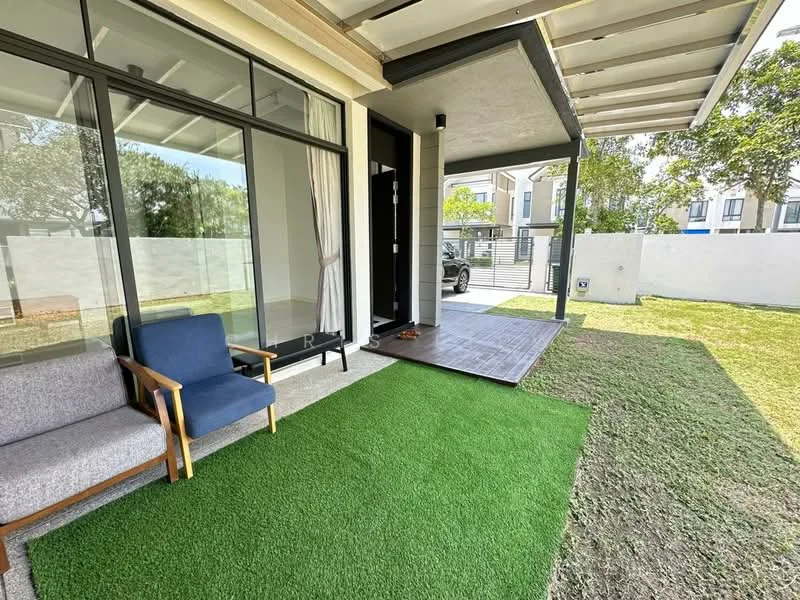 Room features: artificial grass flooring, grey sofa, wooden armchair, sliding glass door, white walls, overhang roof, outdoor space, manicured lawn; style: modern; view: garden.