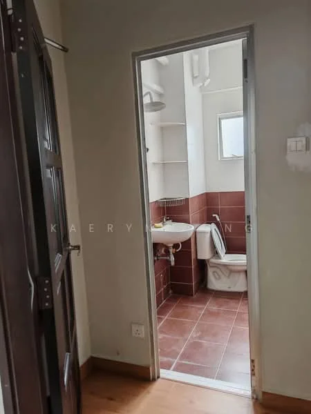 Bathroom features: white walls, brown tiled flooring, toilet, sink, mirror, window, shelf, shower head, plumbing fixtures. Room features: wooden door, door frame, light switch.
