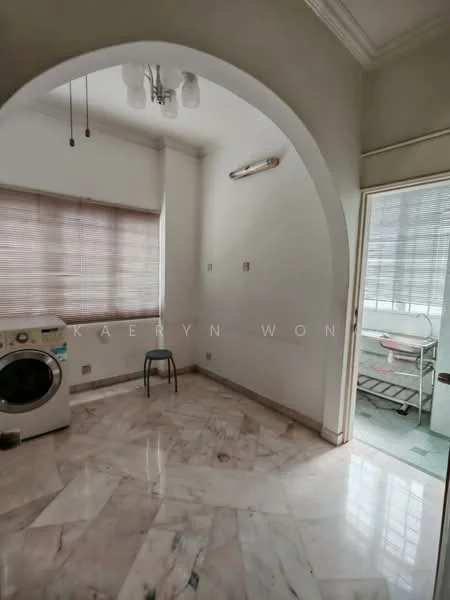 Laundry features: marble flooring, white painted walls, arched ceiling, ceiling light fixture, window with blinds, washing machine, single chair, door leading to another room.