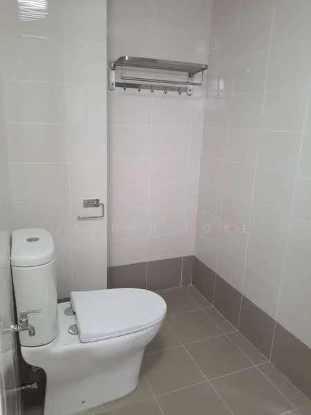 Bathroom features: white ceramic toilet, single-piece toilet, chrome flush handle, wall-mounted towel rack, light grey tiled walls, beige tiled flooring, corner shelf, neutral color scheme; style: modern.