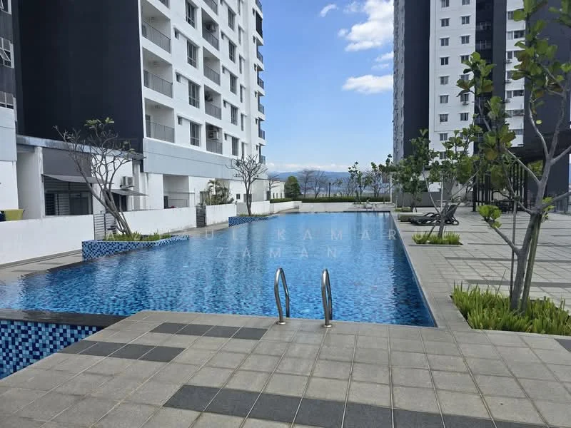 Exterior type: high-rise condominium; features: infinity pool, pool deck with loungers, landscaped garden with trees, tiled pool surround, concrete paving, surrounding high-rise buildings, clear blue sky, mountain view in background; style: modern.