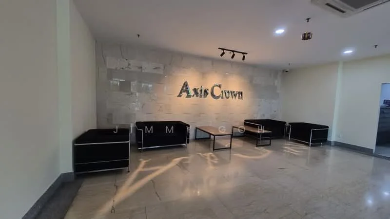 Room features: marble flooring, cream painted walls, feature wall with stone cladding, recessed lighting, black sofas, glass coffee table, ceiling-mounted lighting, air conditioning unit; style: modern.